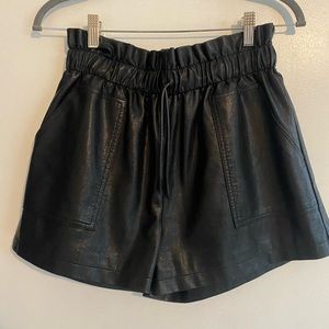 Black leather shorts